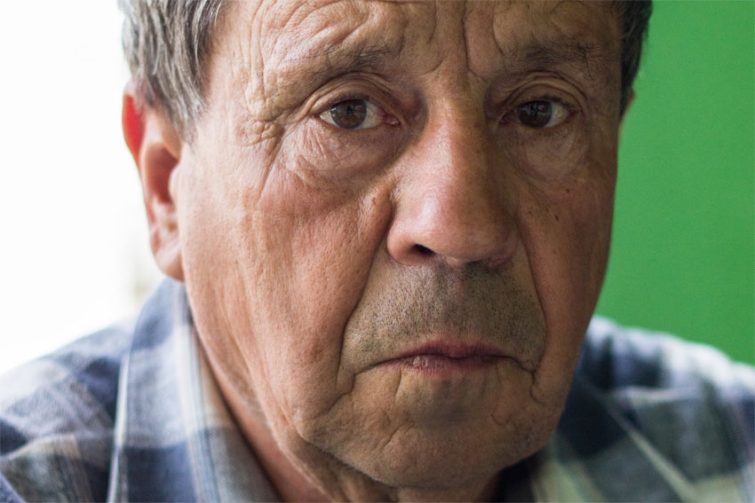 image of elderly gentlemen concerned about the safety of an adult
